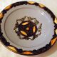 Hollow glazed terracotta dish with oriental decor to hang
