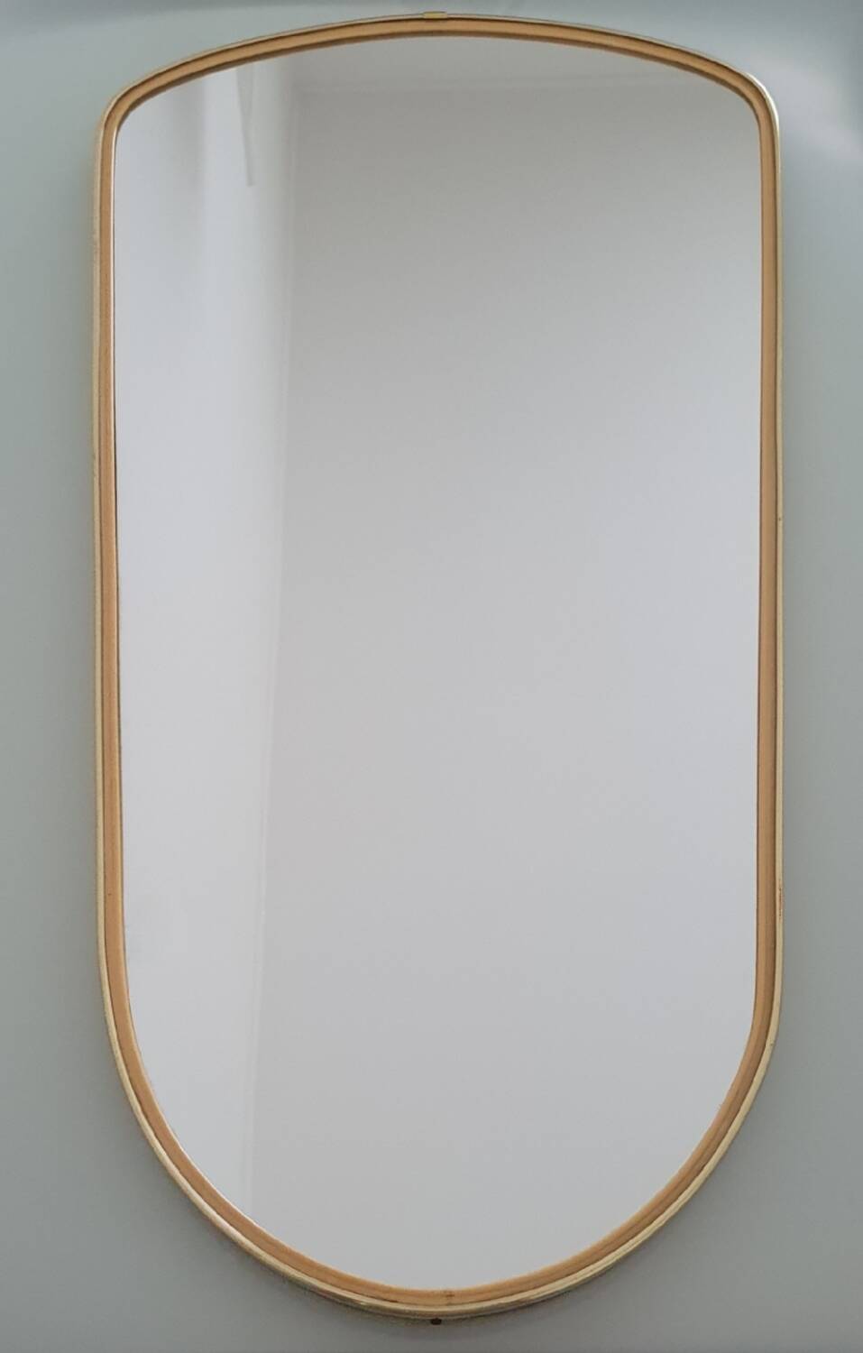 Large vintage ovoid mirror with gold and black edges - 1960s