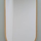 Grand miroir ovoïde vintage à bords dorés et noir - années 1960
