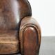 Armchair made of comfortable sheepskin leather in Art Deco design