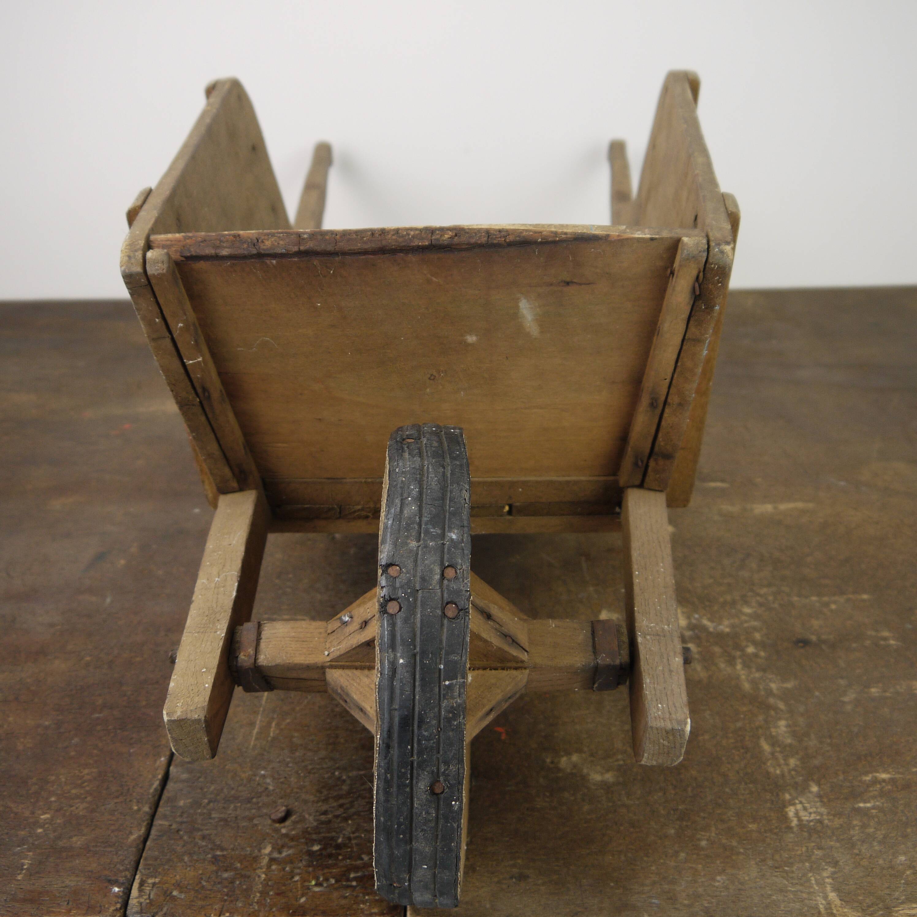 Children's wooden wheelbarrow