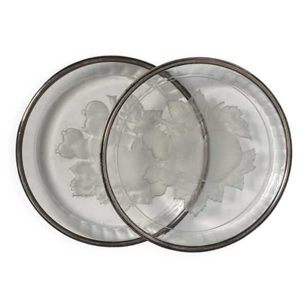 Paire de dessous de bouteilles en cristal et argent poinçonné Minerve