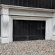 Large Charles X fireplace in white Carrara marble, 19th century.