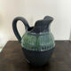 Stoneware jug with glaze