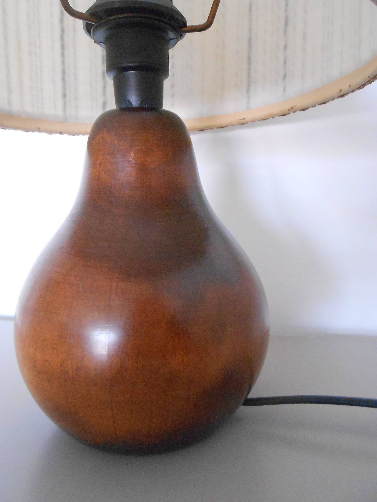 Carved wood lamp and wool yarn lampshade