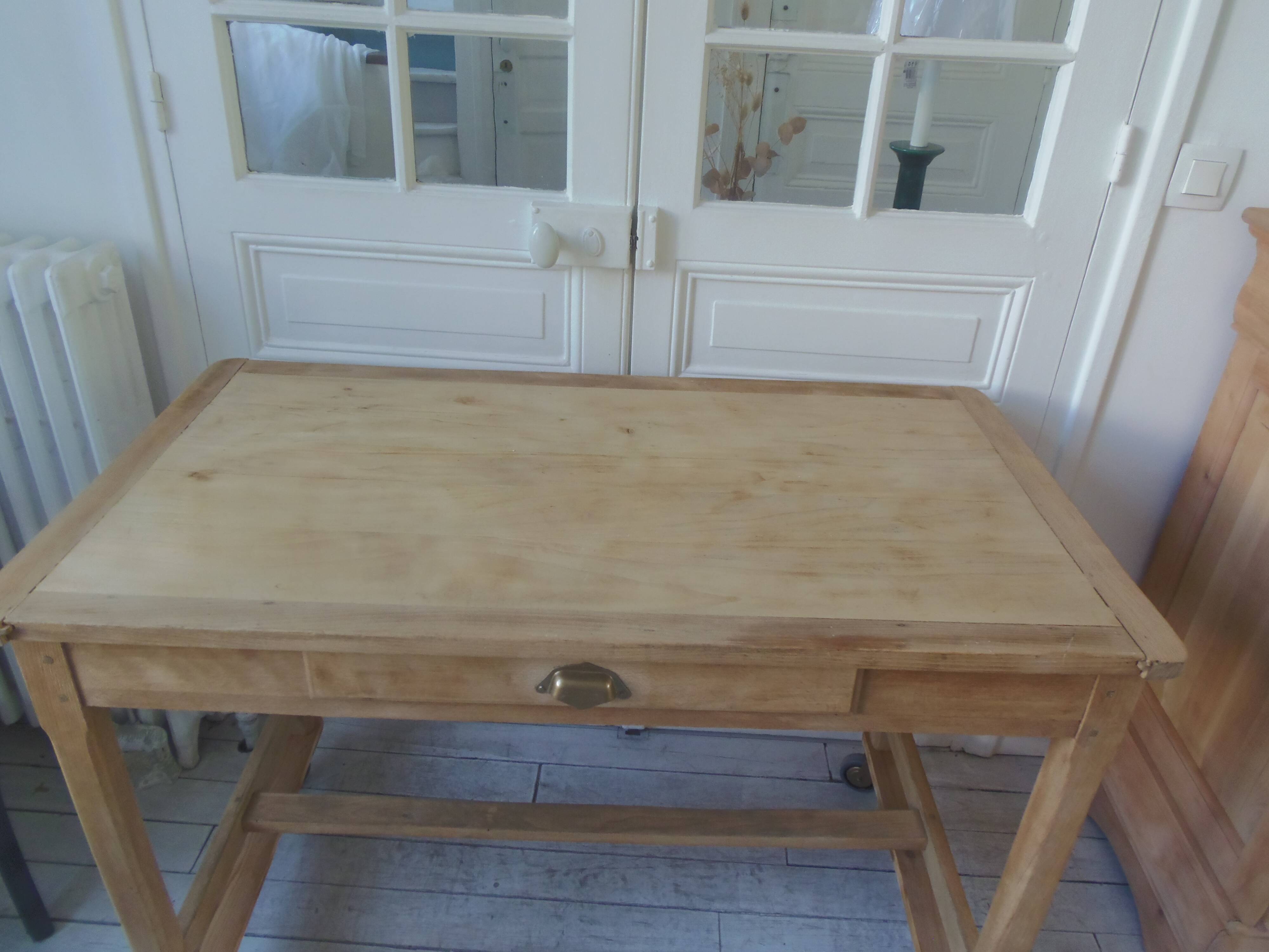 Vintage kitchen table on casters.