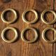 Lot of 6 patinated golden metal towel rings