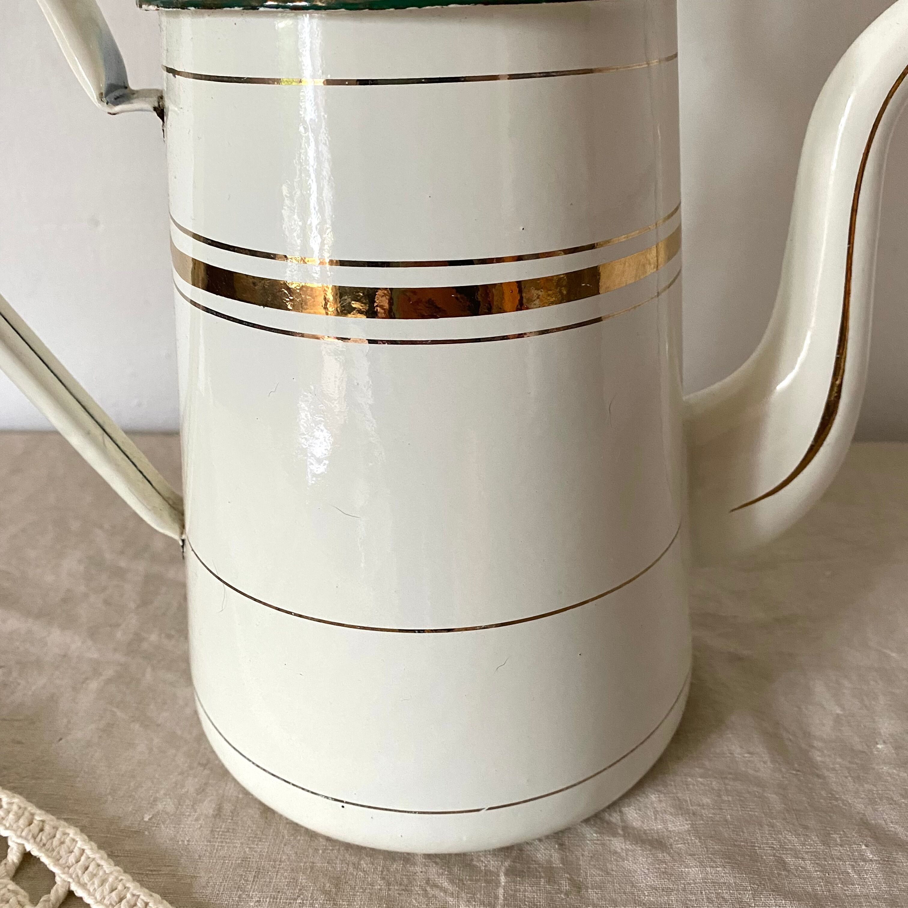Antique coffee maker in enamelled sheet metal