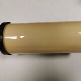Old wall lamp, made of bakelite with a vanilla/egg colored glass shade.