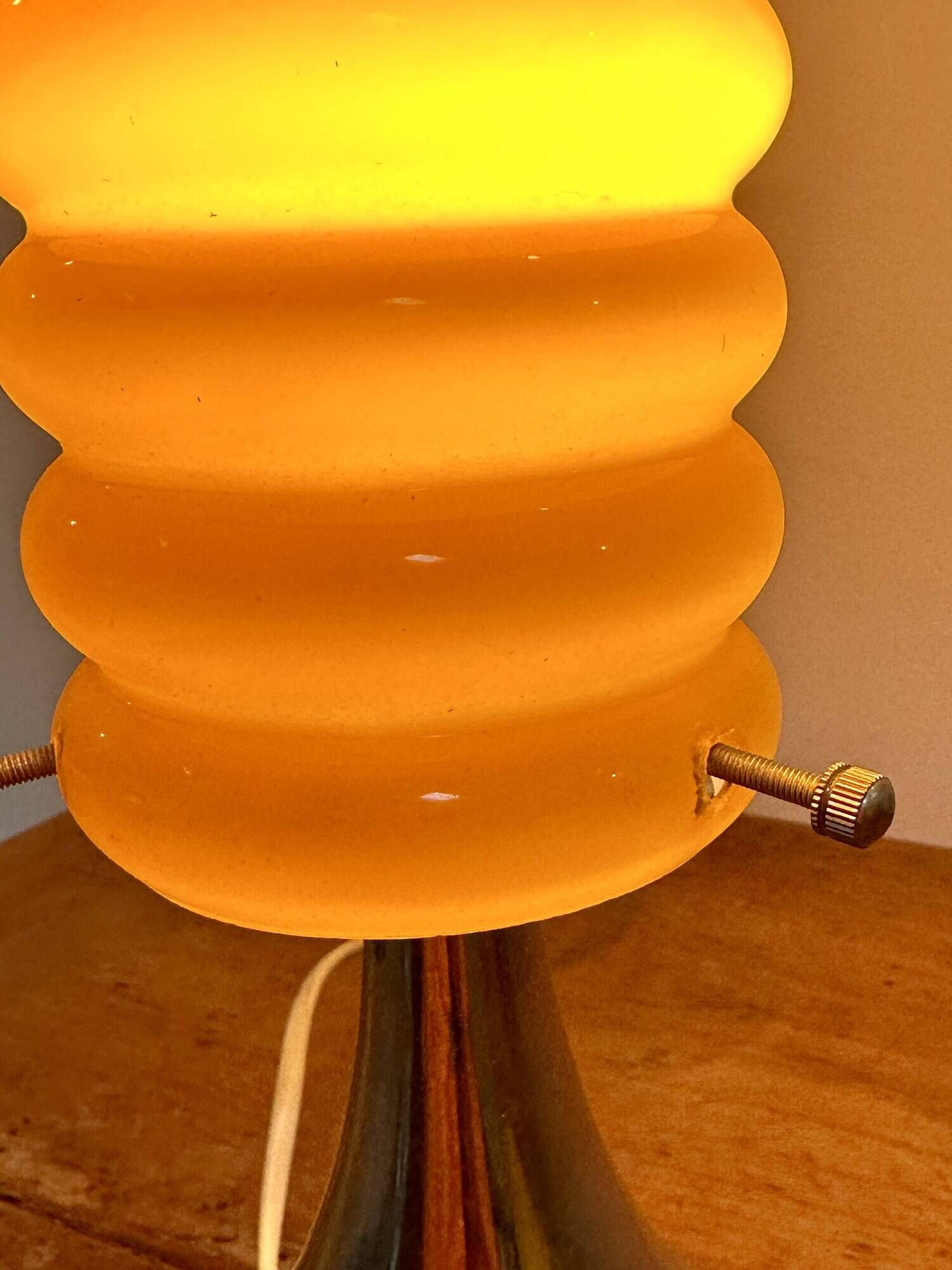 Vintage orange lamp with chrome tulip base and glass shade