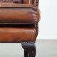 Brown leather wingback Chesterfield armchair