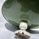 Antique wall lamp with an enamelled metal shade and porcelain.