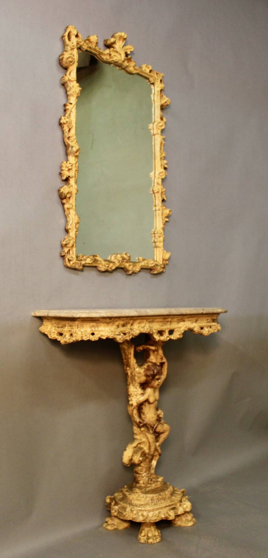 Marble top console and its rocaille style mirror