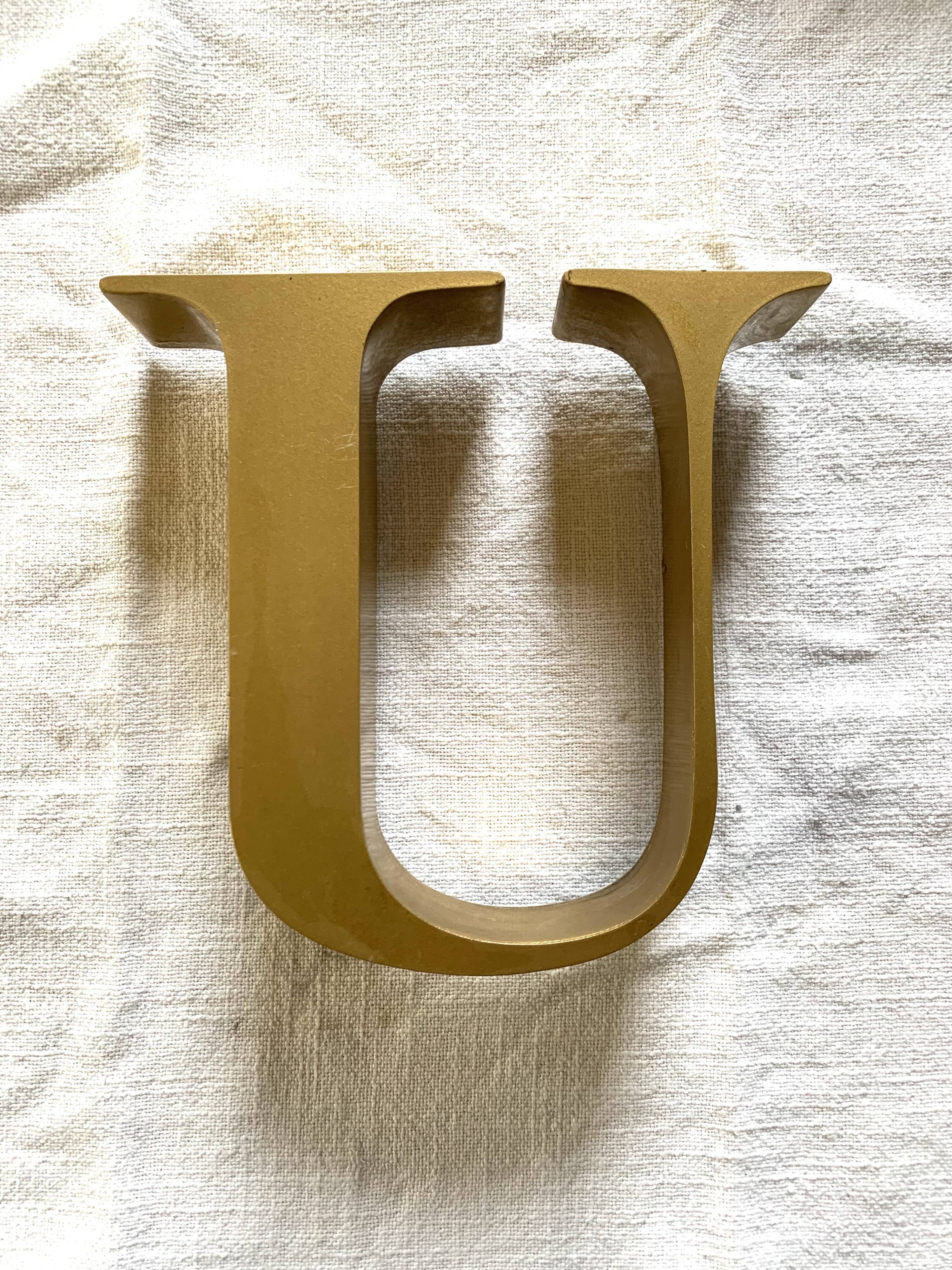 Vintage metal letter