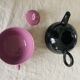 Selfish teapot and its cup