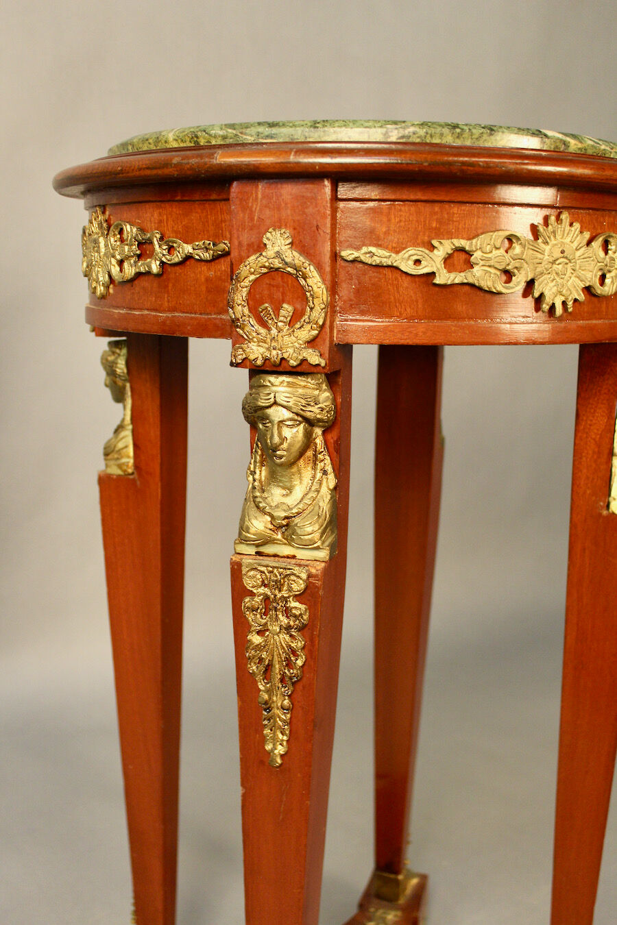 Empire style pedestal table with green marble