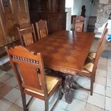 Breton dining room table with 2 extensions and 6 chairs with carved Breton characters