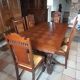 Breton dining room table with 2 extensions and 6 chairs with carved Breton characters