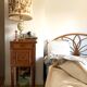 Antique table lamp in marble and tapestry