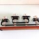 Four-headed candlestick in teak and chrome metal Scandinavian style / vintage 60s-70s