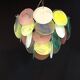 Handcrafted chandelier with Murano glass discs.