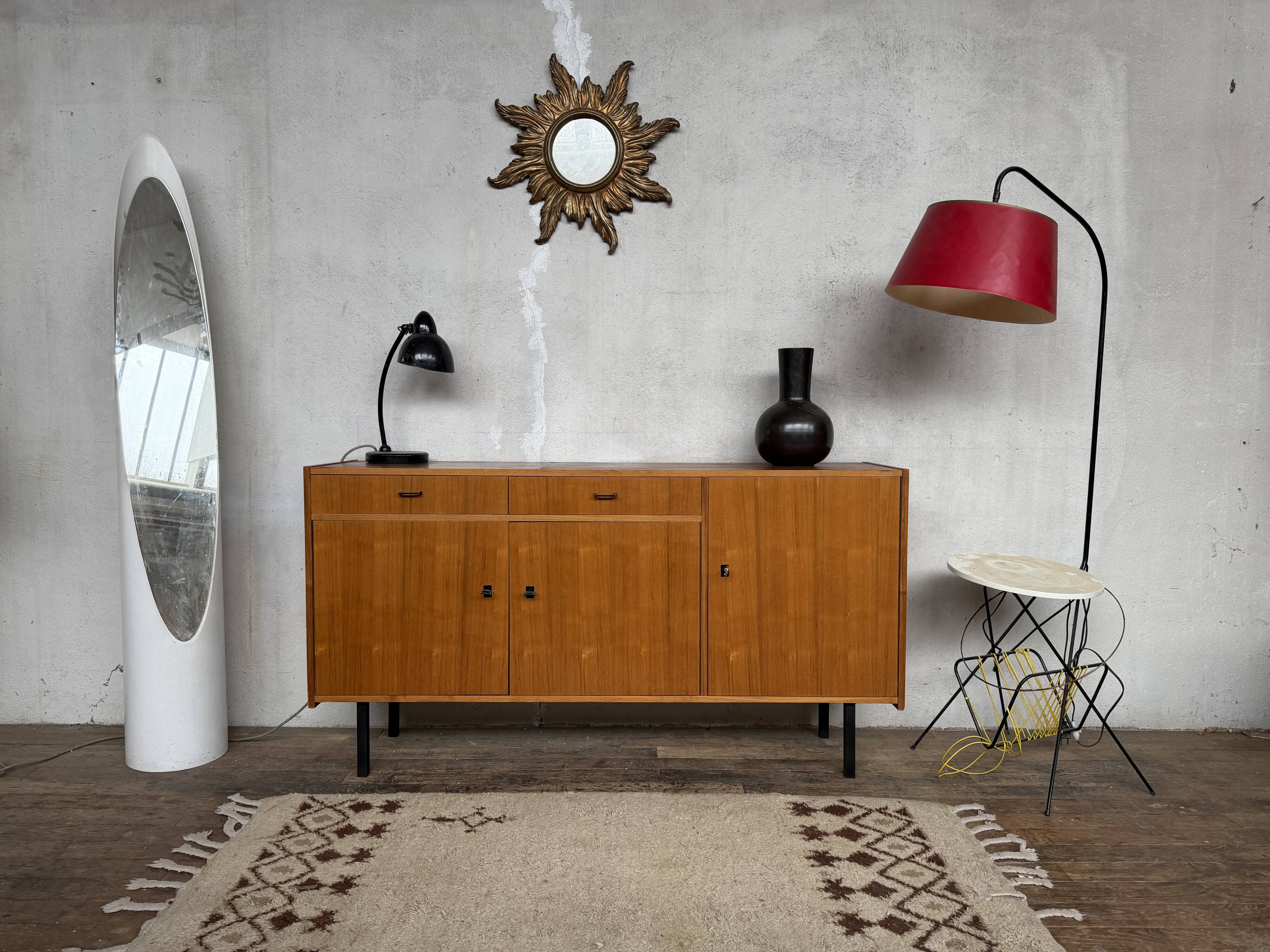 Vintage Scandinavian enfilade with metal legs.