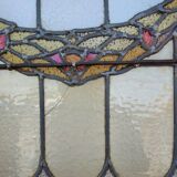 porte en chêne avec des vitraux