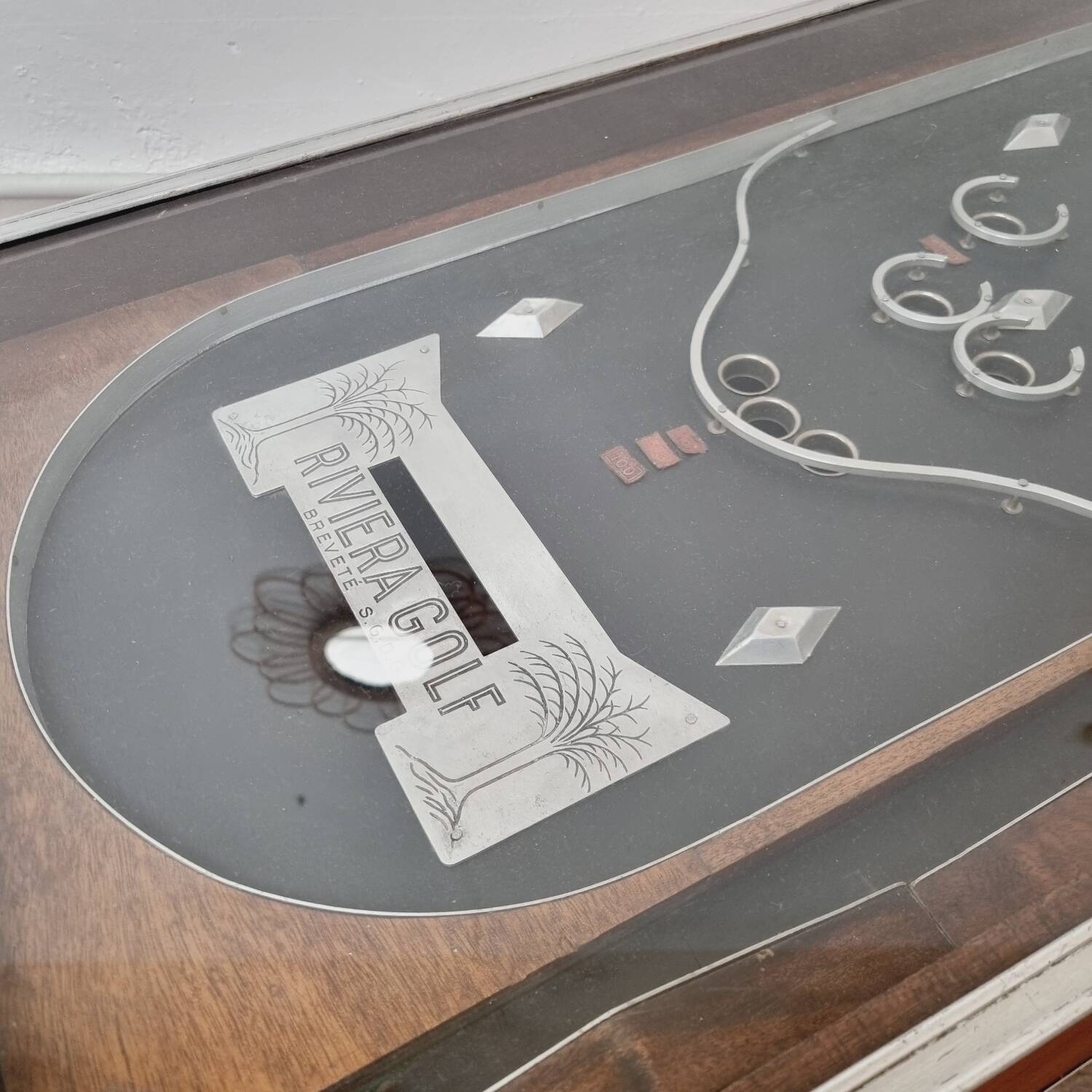 Industrial coffee table & old pinball machine 1900