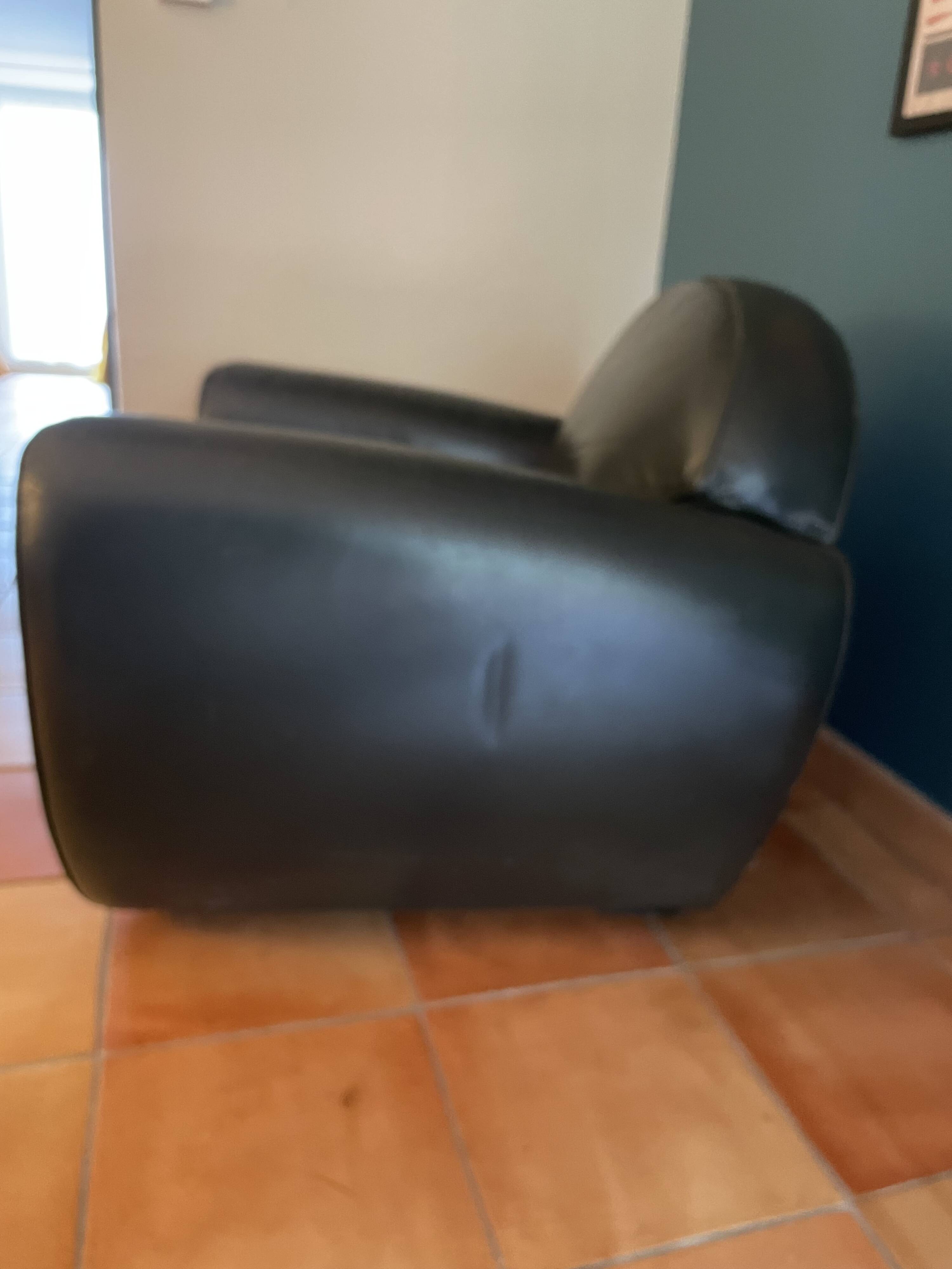 Green leather club chairs