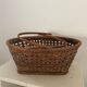 Vintage wicker and cane basket in bohemian style