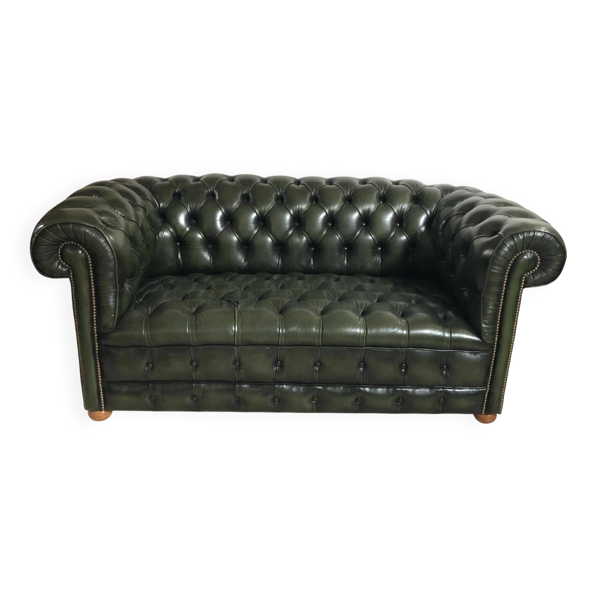 Patinated green English Chesterfield sofa