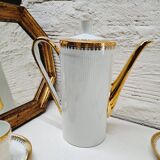 White and gold porcelain coffee maker and cups