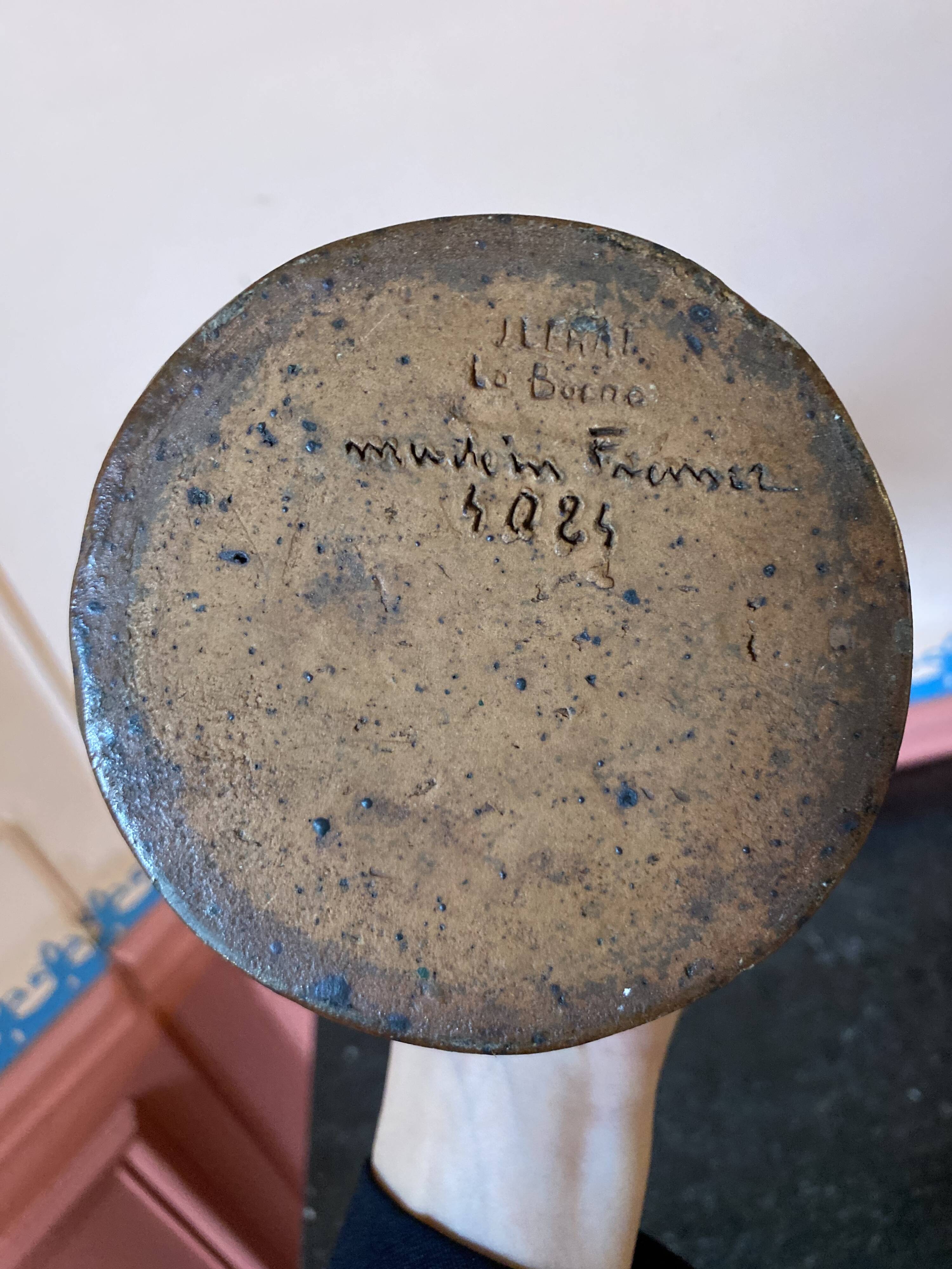 Anthropomorphic stoneware pitcher signed Jean Lerat