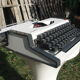Revised typewriter and Olympia Traveller luxury with his satchel