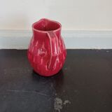 Small pitcher in old red earthenware