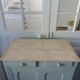 Small vintage Parisian sideboard with 2 doors and 2 drawers, enhanced in verdigris