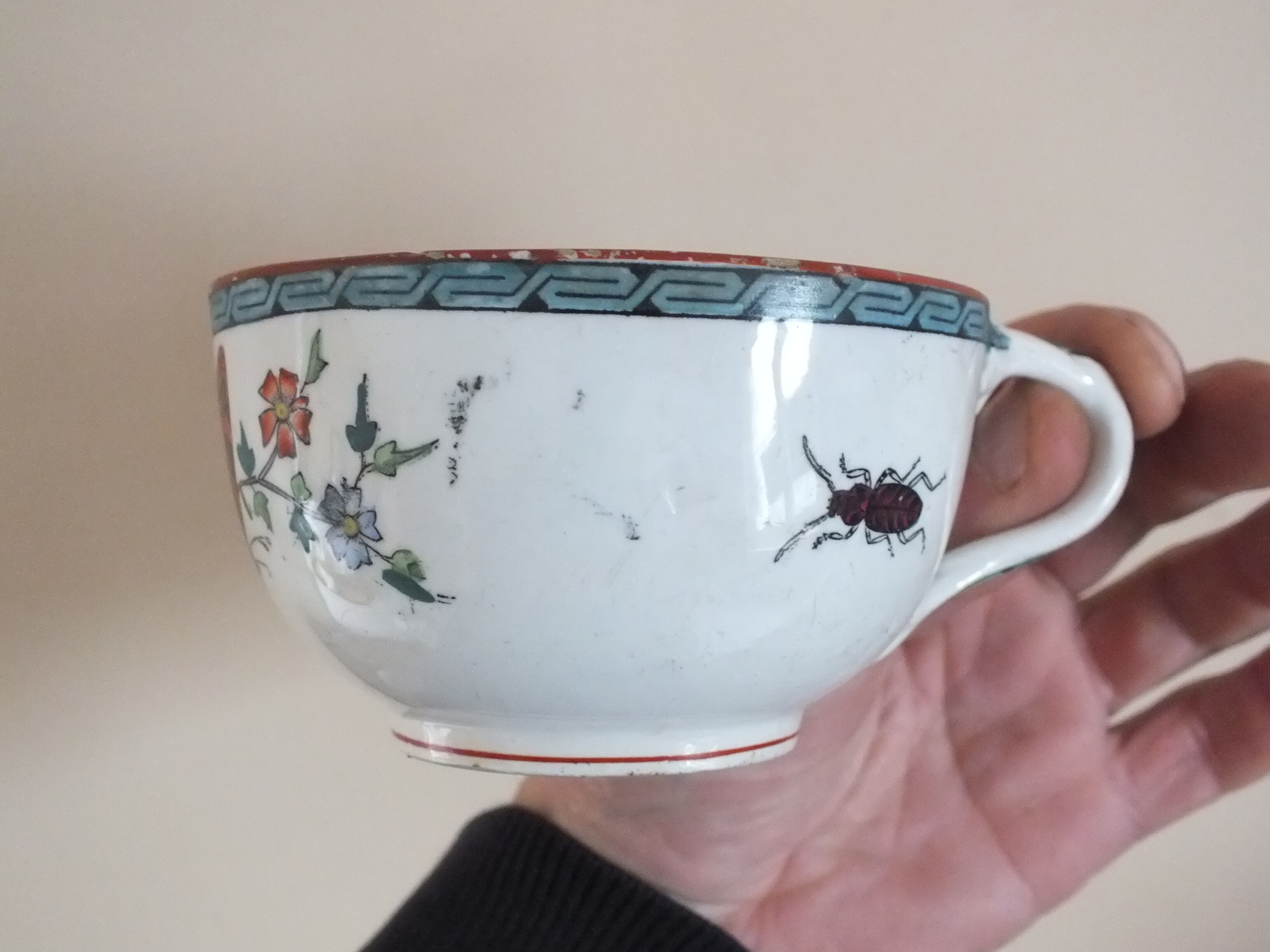 3 cups of English porcelain decorated with butterflies