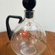 Enamelled glass carafe 1920