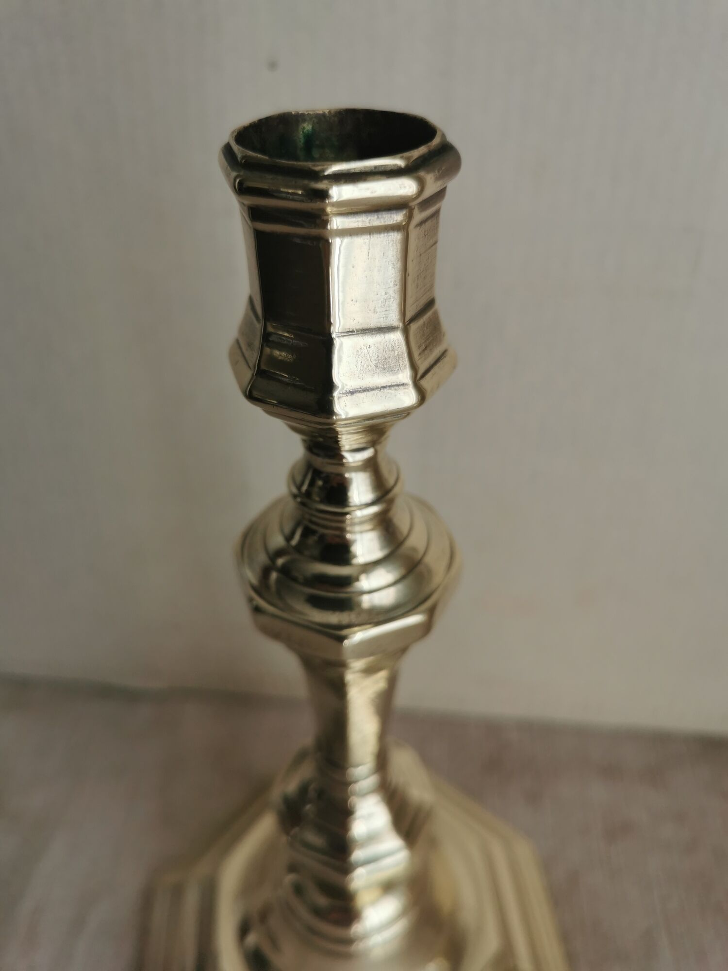 Pair of polished bronze candle holders XVIII th century
