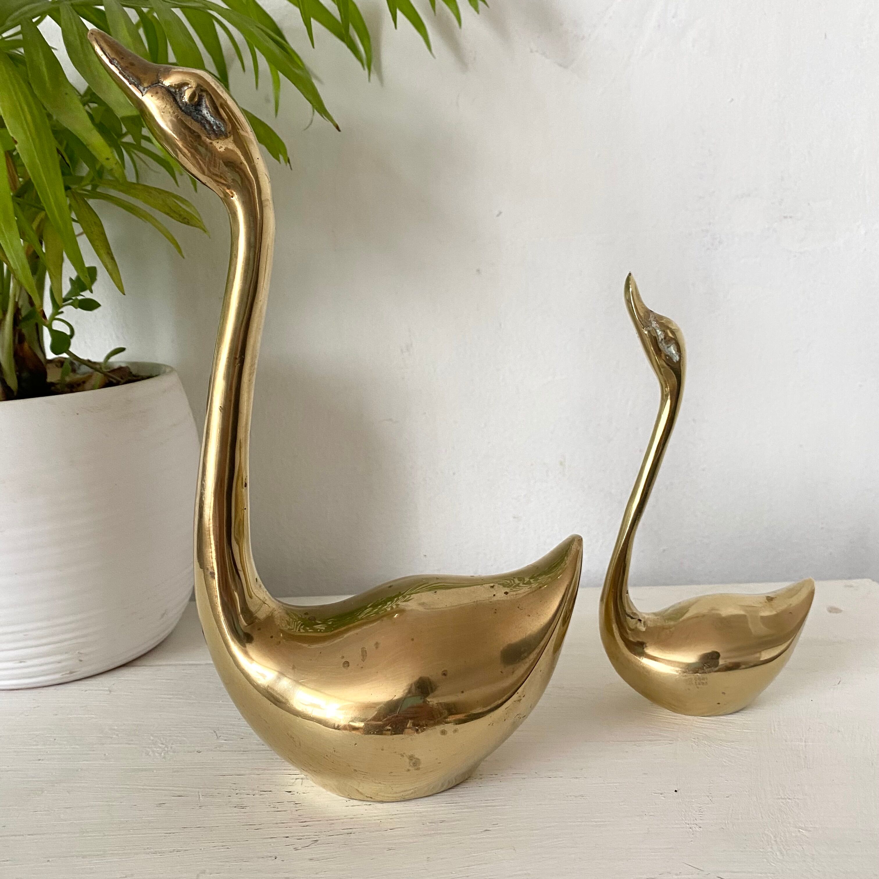 Golden brass birds