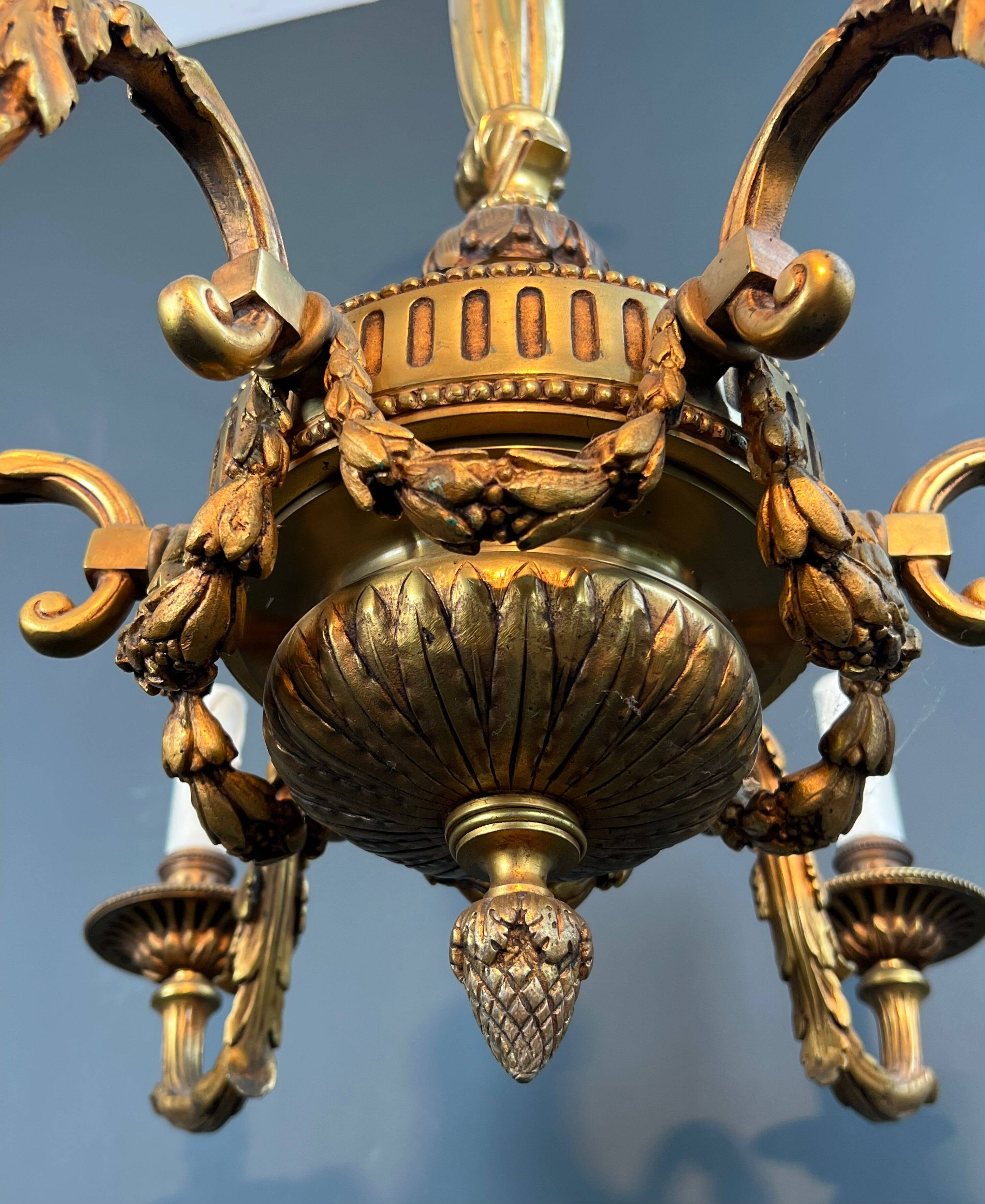 Bronze chandelier in Louis XVI style with 6 arms.