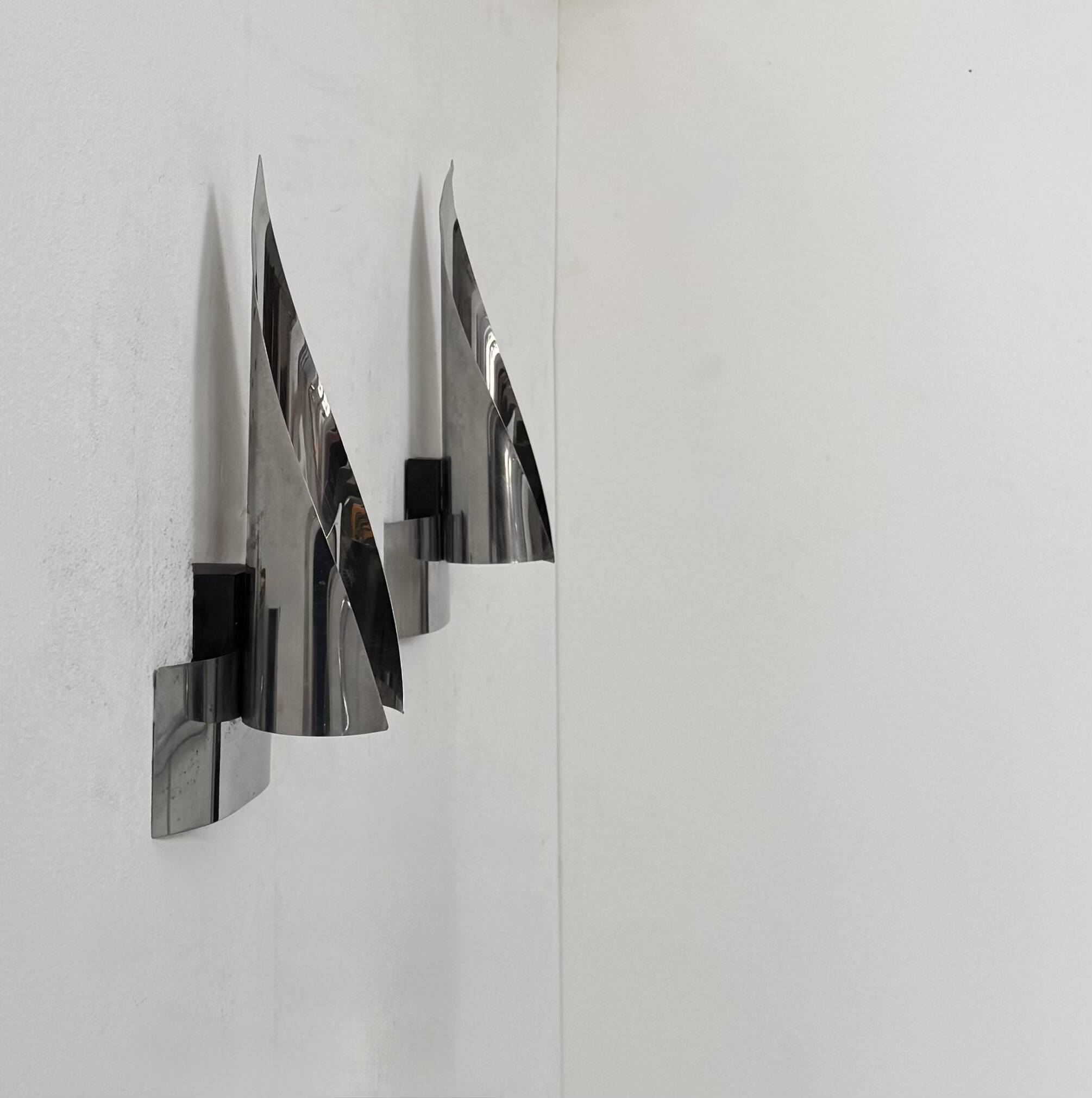 Pair of vintage wall lights, chrome metal, France, 1970.