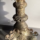 Large bronze candlestick with tripod and winged dog decoration, 19th century.