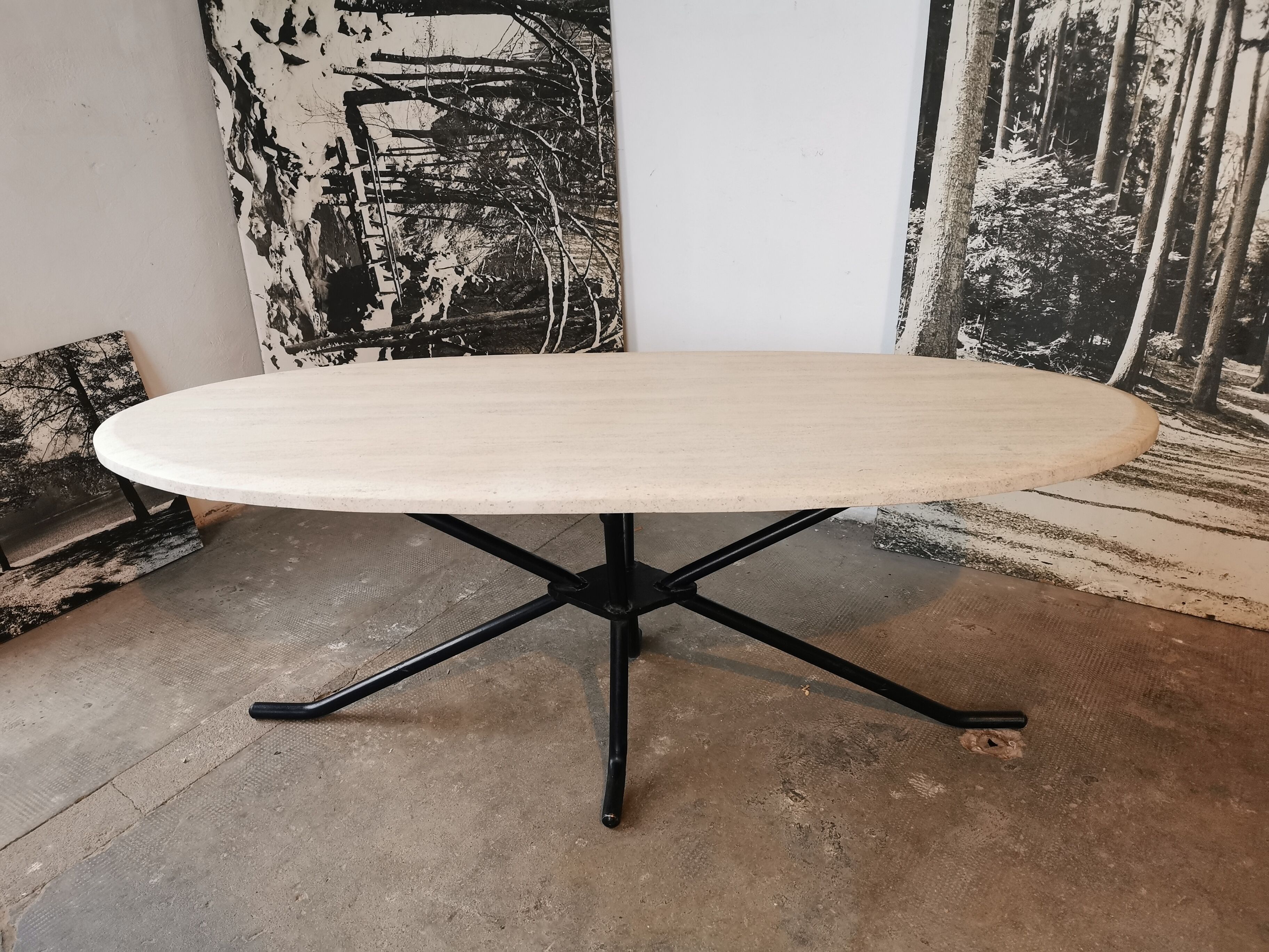 Large oval coffee table in travertine and metal