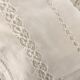 Net-style embroidered cotton tablecloth.