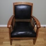Colonial armchair in teak and black leather