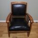 Fauteuil colonial en teck et cuir noir