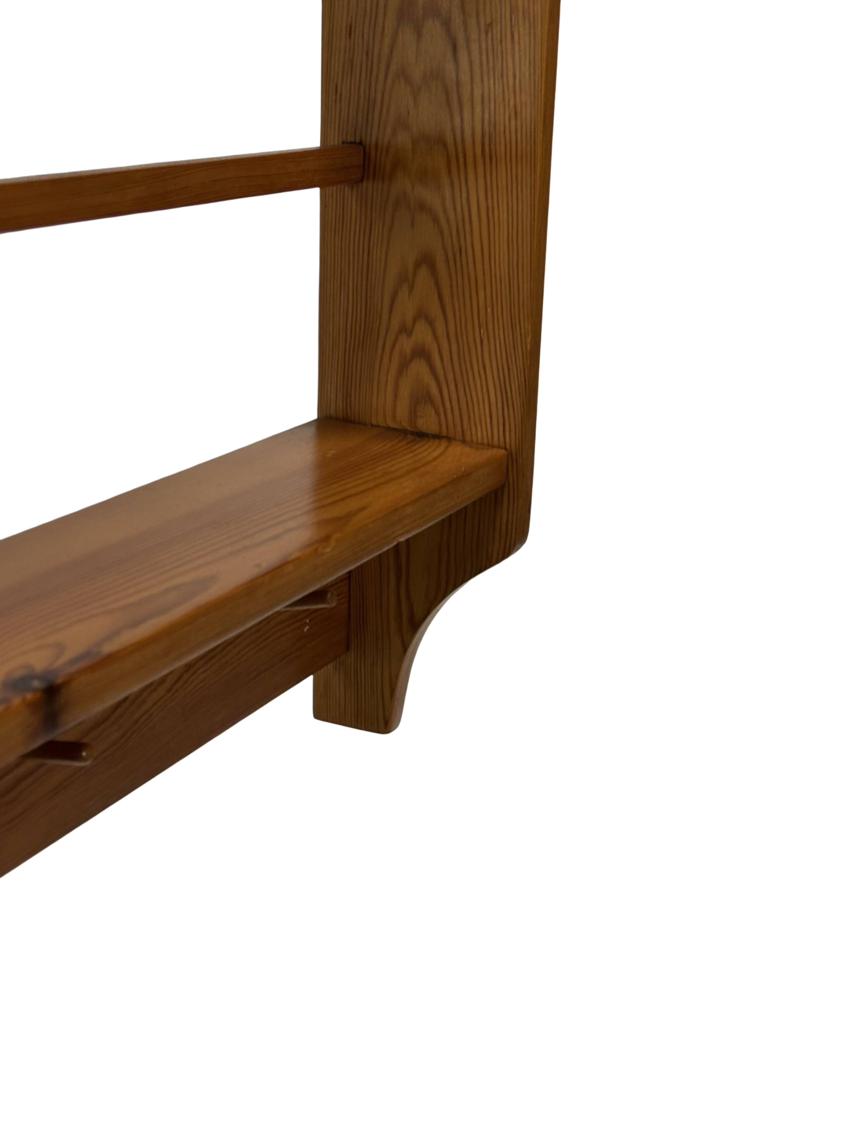 Vintage wooden wall shelve rack bookshelf in pinewood minimalist design