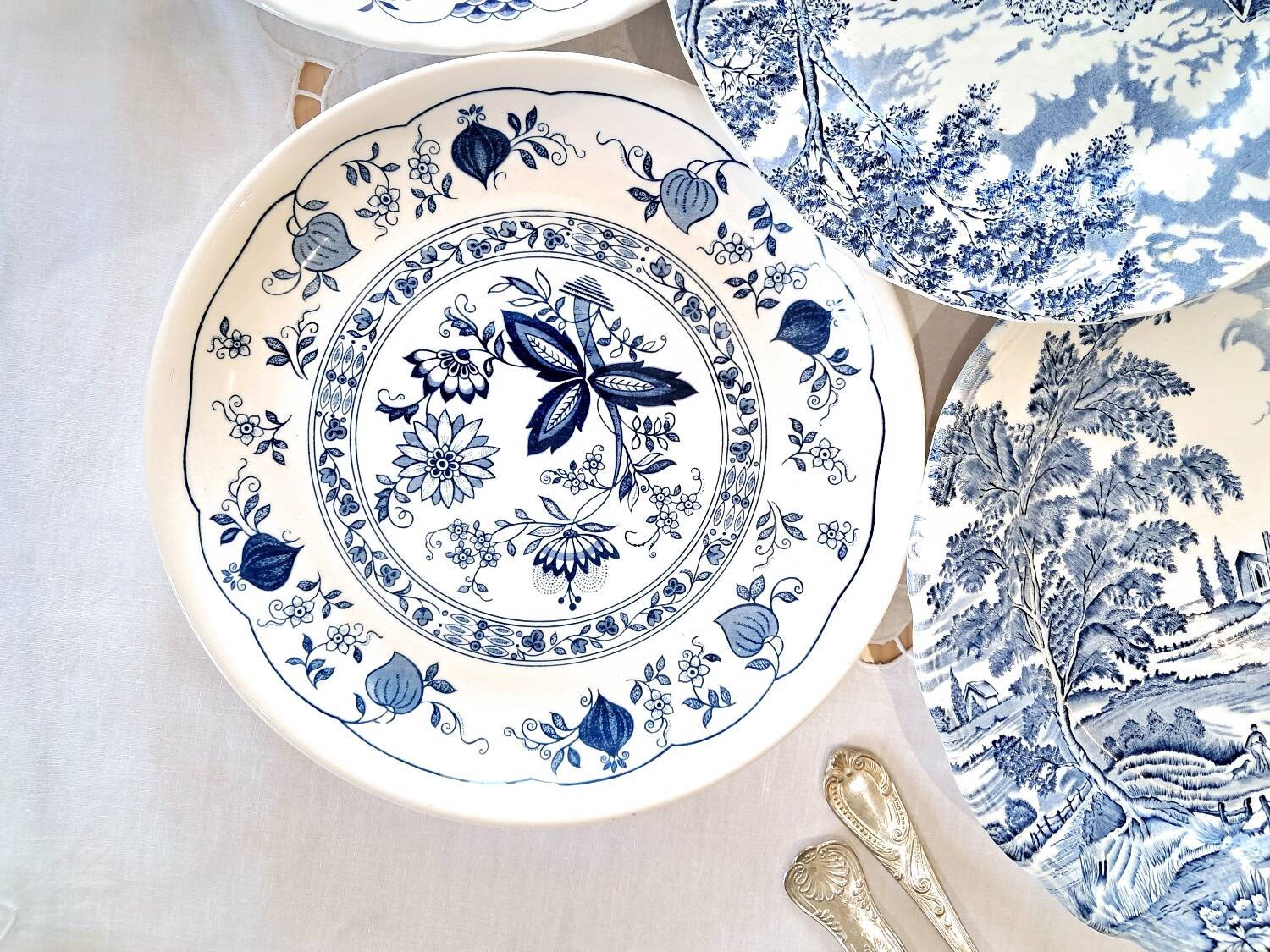 Mismatched antique dinner plates