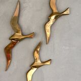 Trio of brass birds